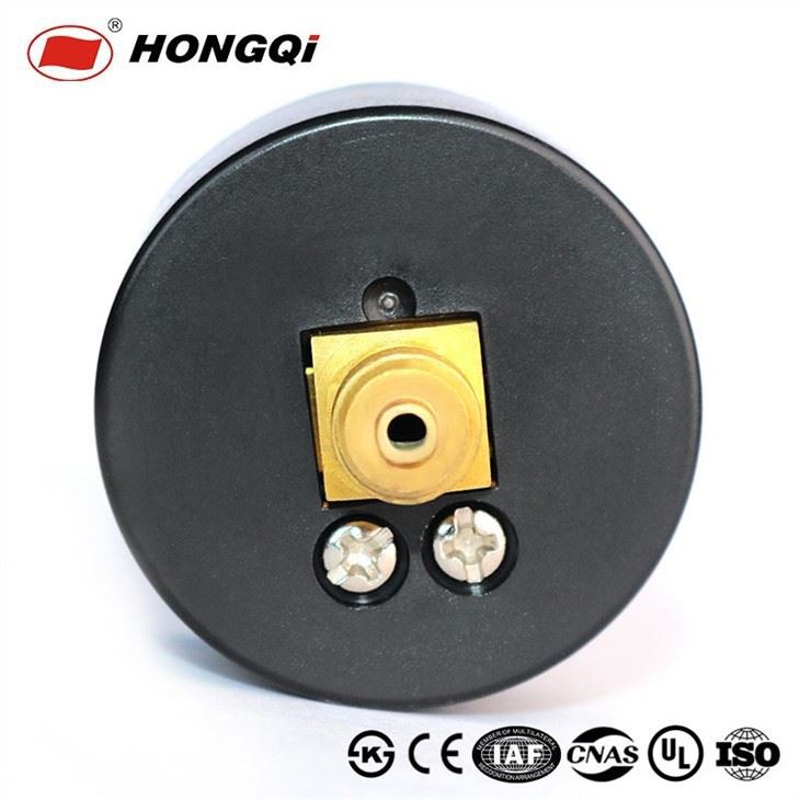 On the back of the pressure gauge or manometer